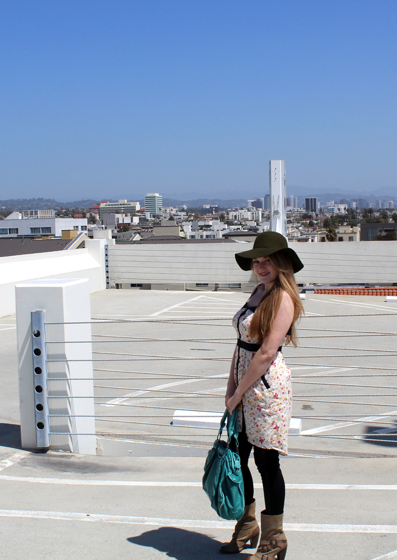 Floral dress by BCBGeneration, Vegan leather leggings from FACTORY by Erik Hart, hat by Tarnish